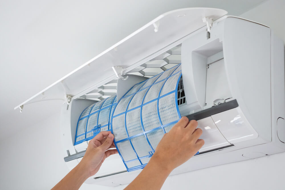 Man Hand Hold Air Conditioner Filter Cleaning Concept